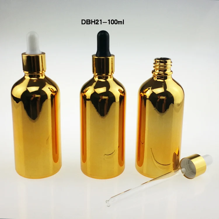 Wholesale 100pcs unique 100ml large dropper bottle for  essential oil , hot sale golden 100 ml glass bottle with dropper cap