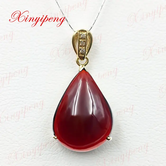 

18 k yellow gold with 100% natural garnet pendant Simple and easy Fine jewelry All clean flawless Wine red