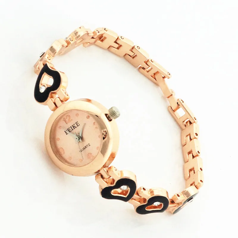 

Free shipping!Bracelet style quartz watches,three hearts design with crystal deco chain alloy band,quartz movement,gold case