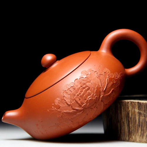 

78 ball hole flat beauty pot Yixing teapot famous handmade teapot Zhu mud flat ore peony depict beauty teapot