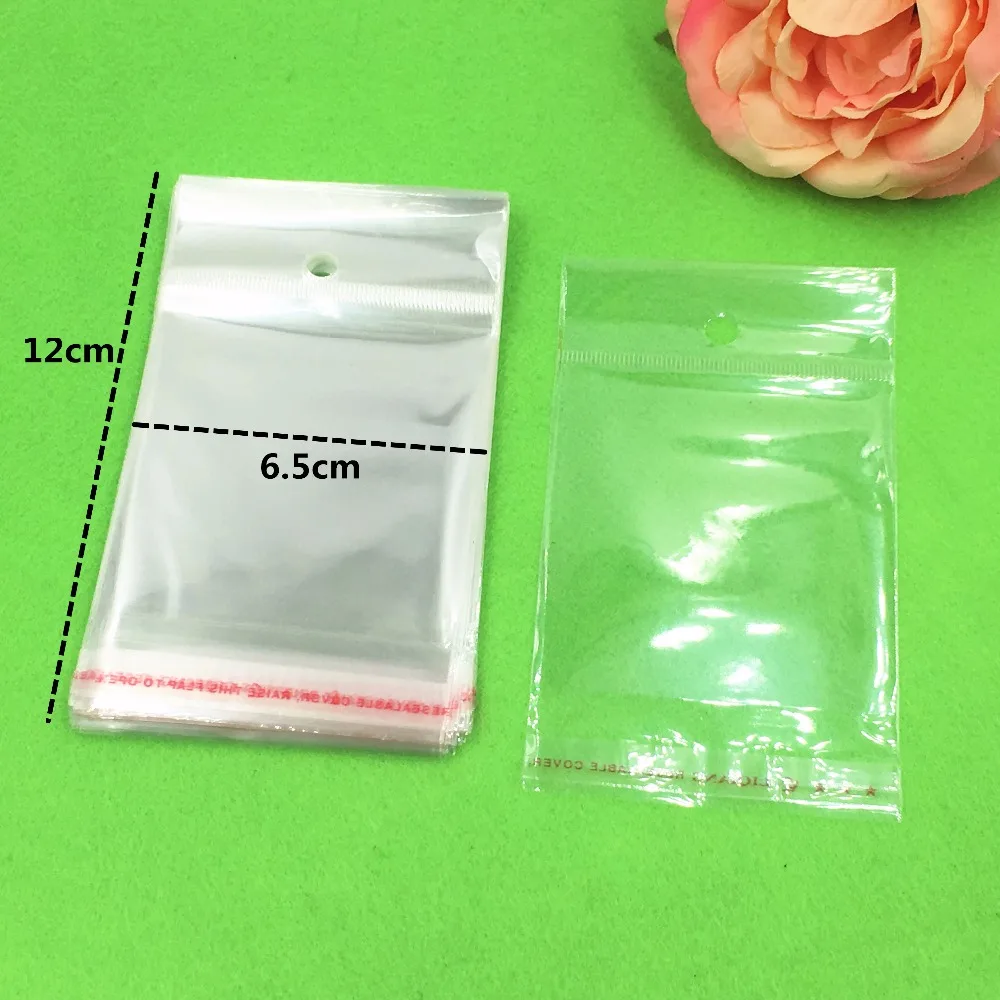 1000 pcs 12x6.5 cm Batal Transparan OPP Tas dengan Menggantung lubang Packing Plastik Tas Self Adhesive Seal tahan air OPP Tas