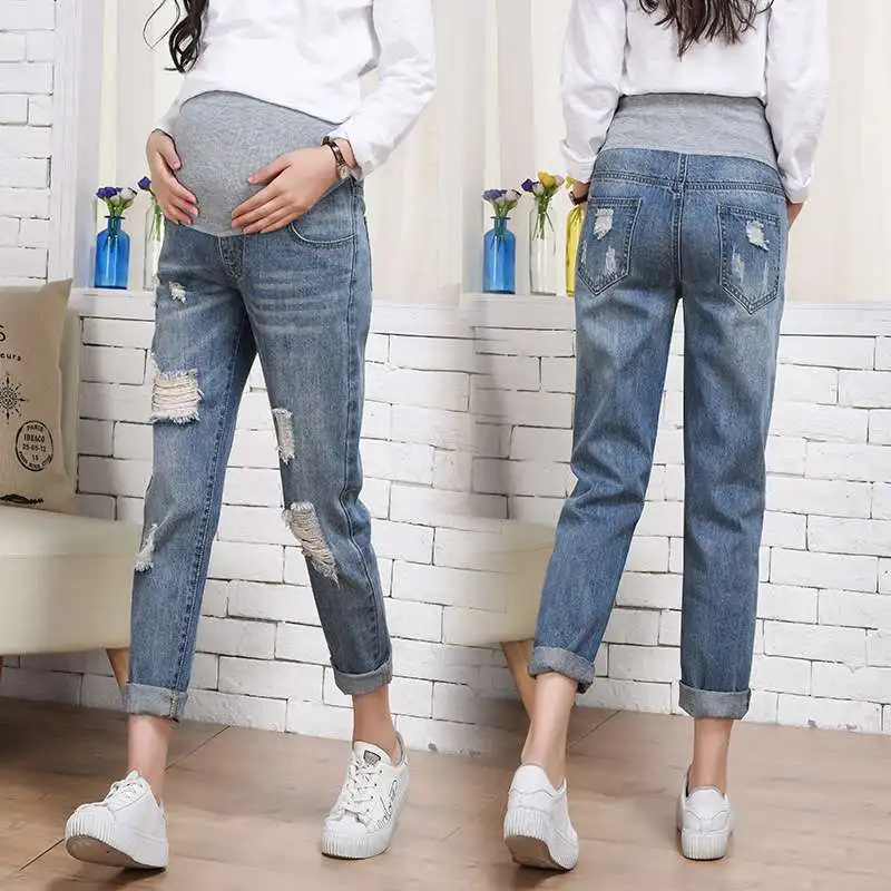 

2018 pregnant women jeans autumn new tide mother Korea hole loose stomach lift pants