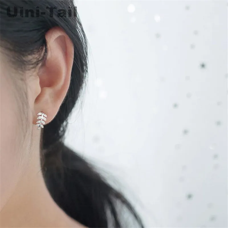 Uini-Tail hot new 925 Tibetan silver branches leaves earrings female simple small fresh mini tree technology ear hook  ED170