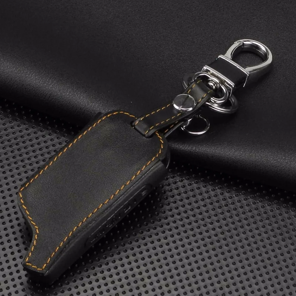 jingyuqin Remote 4 Buttons Leather Case Cover Russian Version Vehicle Security Two Way Car Alarm System LCD TOMAHAWK X5 Keychain