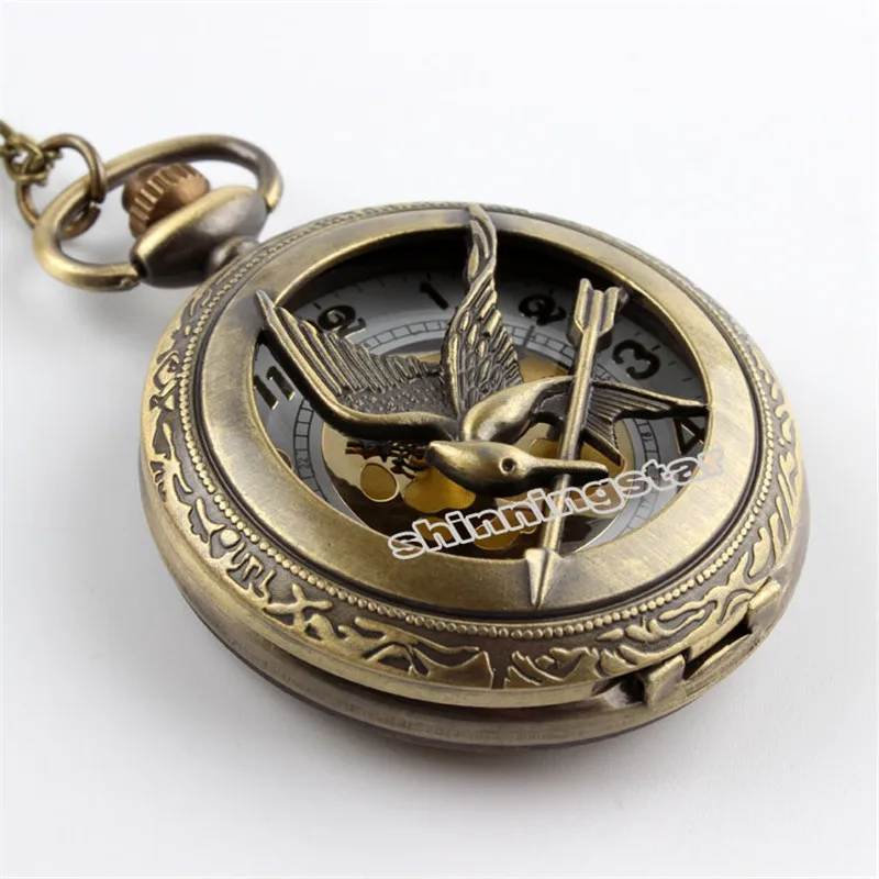 2023 New Arrival The Hunger Games Retro Bronze Hollow Quartz Pocket Watch Skeleton Bird Clock Pendant Gifts For Men Women Clock