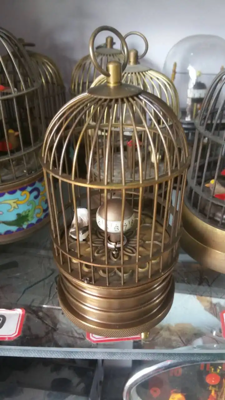 Exquisite Interesting Chinese brass birdcage machine clock with bird inside