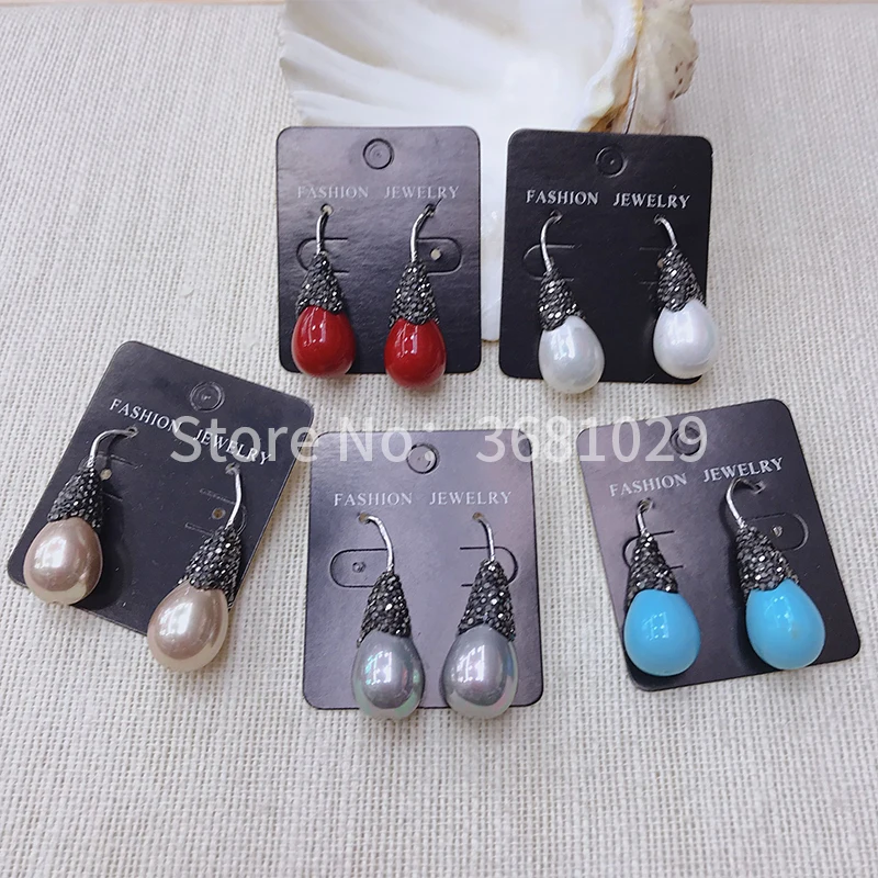 

Fashionable and magnificent shell, pearl and ladies earrings