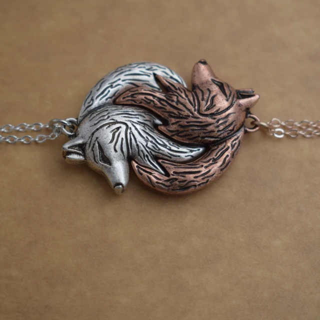 Interlocking wolf necklace store