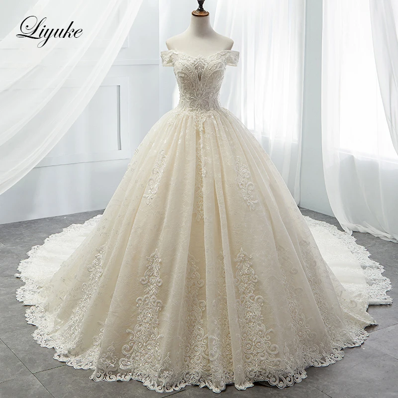 

Liyuke Luxurious Princess Ball Gown Wedding Dress Strapless Elegant Beading Chapel Train Bridal Dress Vestido de boda