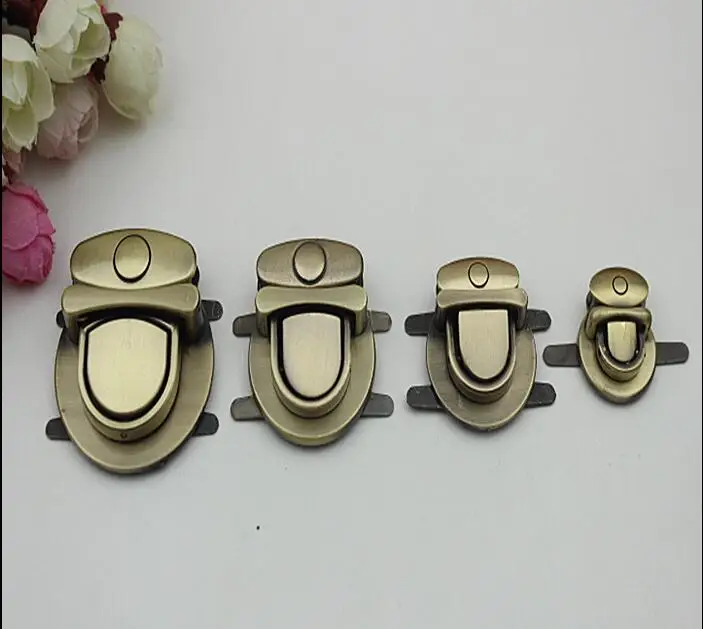 

(10 PCS/lot) high-end electroplating 4 bronze oval leather insert lock diy metal handbags decorative buckle accessories