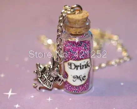 Alice in Wonderland Drink Me Bottle Necklace in Psychedelic  with a Rabbit Charm necklace