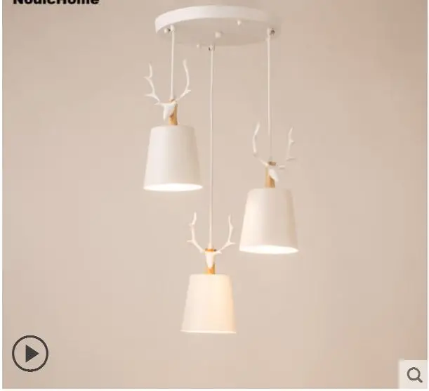 

Nordic restaurant chandelier three head personality creative simple deer head warm modern simple dining chandelier