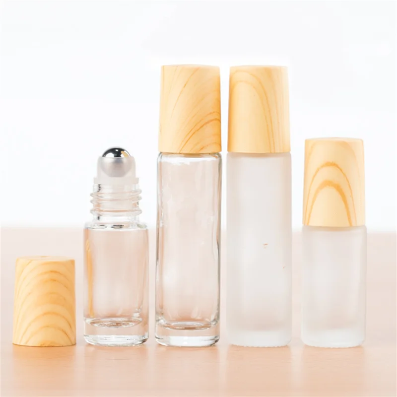 

10/20/30PCS 5ML 10ml Glass essence oil bottle with steel ball Portable Perfum Bottles Conveniet Lip Balms With Roller Balls