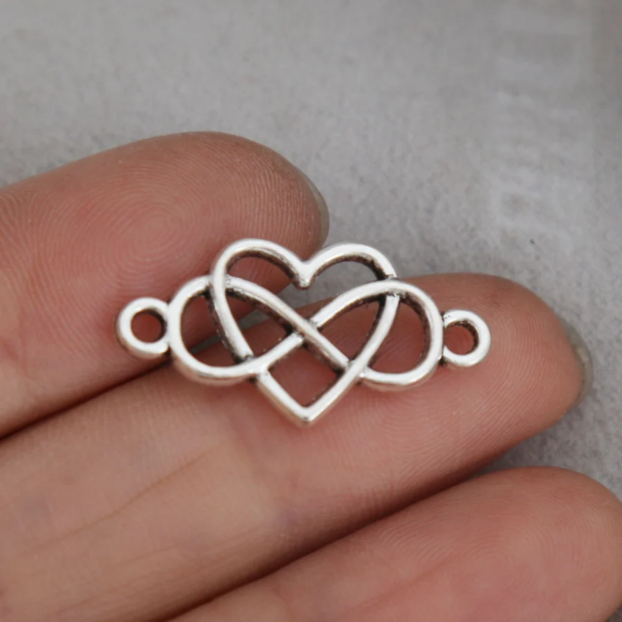 

RAINXTAR Fashion Alloy Antique Silver Color Heart Infinity Connector Charms 12*18mm 100pcs AAC521