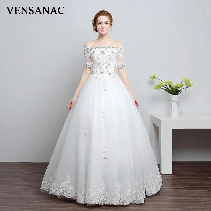 

VENSANAC Crystal Boat Neck Ball Gown Lace Appliques Short Sleeve Wedding Dresses 2018 Sequined Backless Bridal Dress