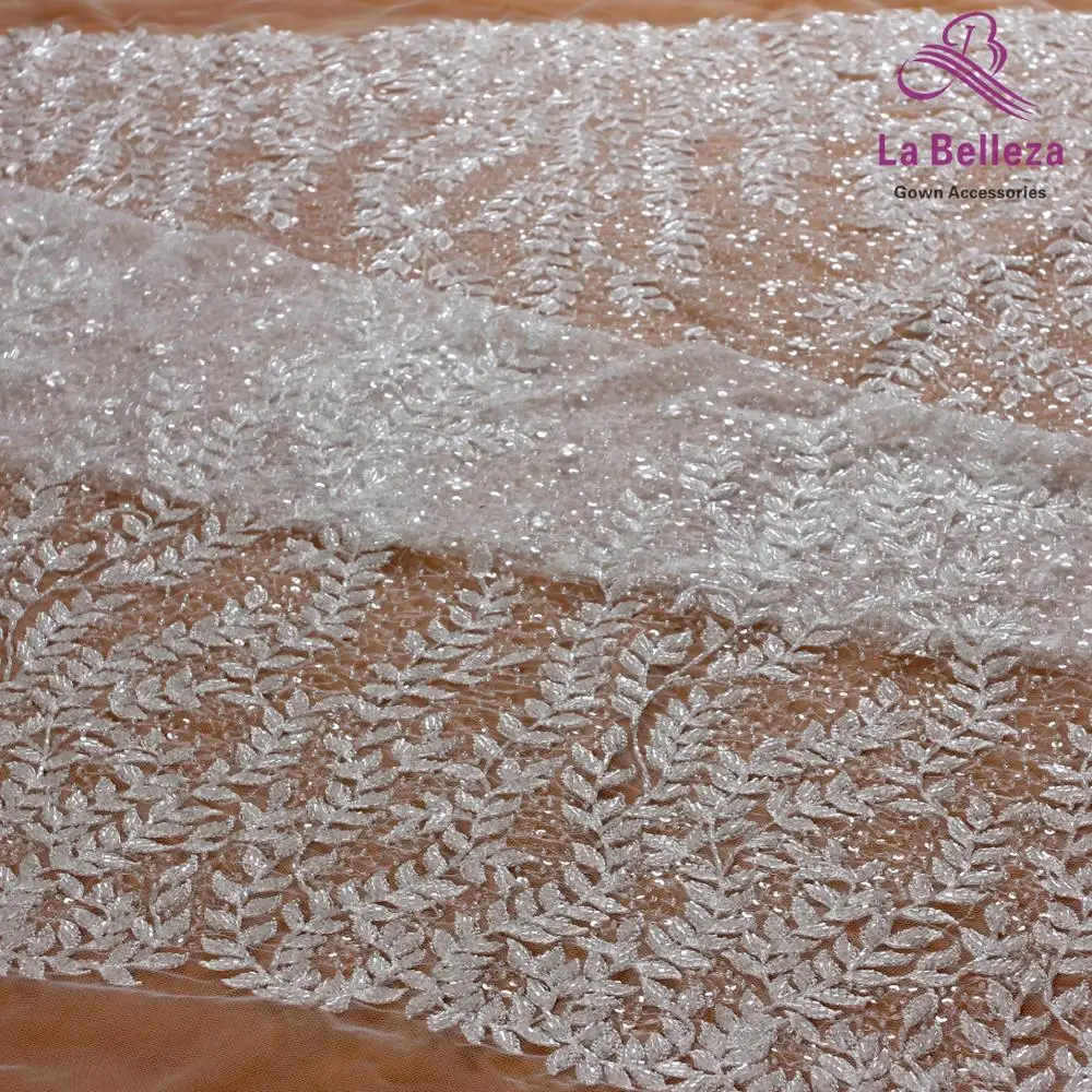 

La Belleza new wedding dress lace fabric off white beaded sequins lace fabric leaves lace 1 yard