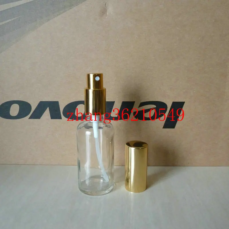 

50ml clear/transparent Glass perfume Bottle With aluminum shiny gold mist sprayer. perfume atomizer bottle container