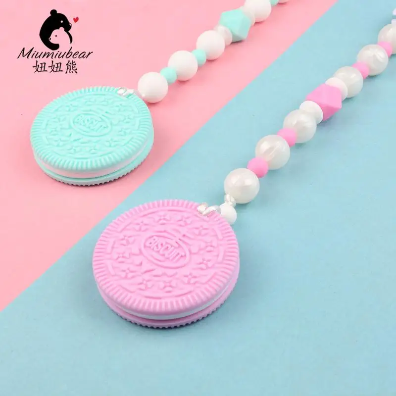 

Oreo cookie baby silicone teether with pacifier clip food grade infant shower gift BPA Free safe teething chewable toy