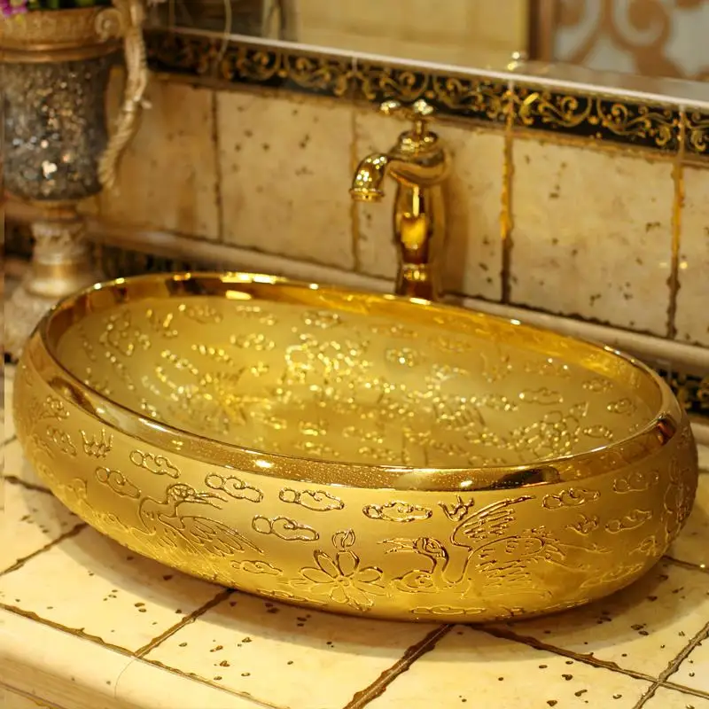 

Luxurious Embossed Golden porcelain bathroom vanity bathroom sink bowl countertop Oval Ceramic wash basin bathroom sink