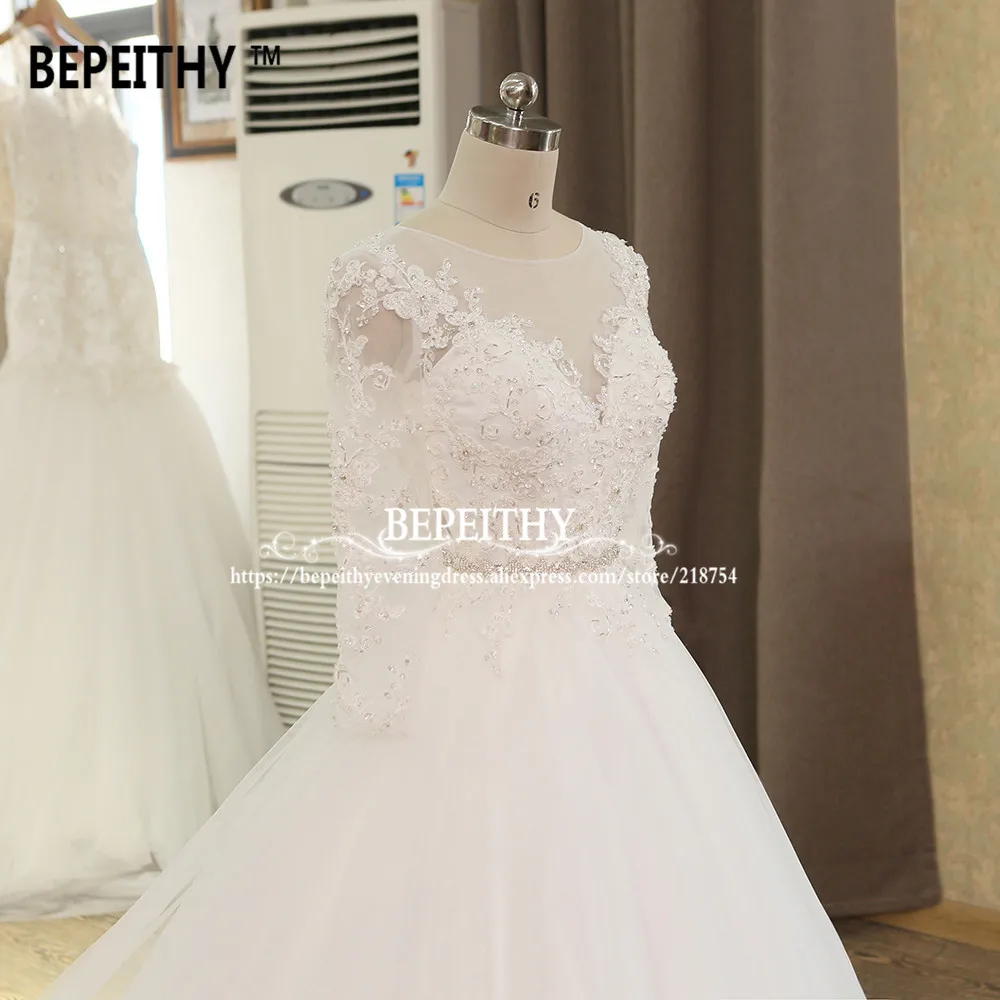 Bepeithy personalizado robe de mariage vestido de baile princesa vestido de casamento com faixa de cristal mangas compridas rendas vestidos de noiva 2022