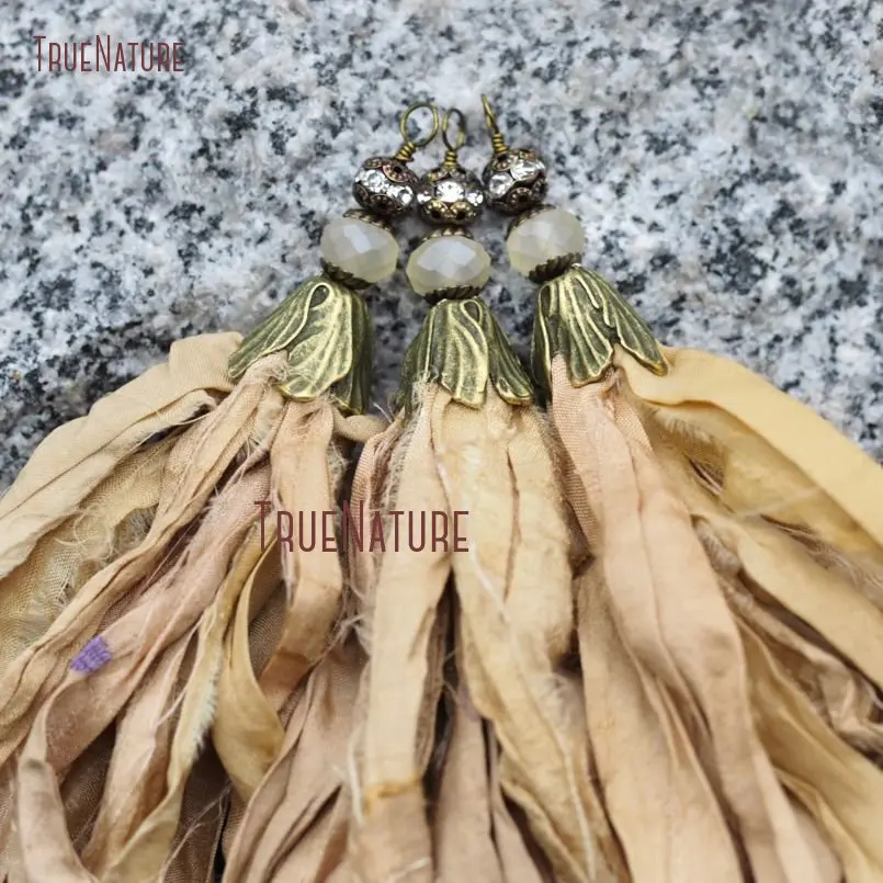 

Electroplated Bronze Color Papaya Whip Sari Silk Tassel Charm Indian Style Boho Silk Tassel With Faceted Bead In 6.8 inch PM8974