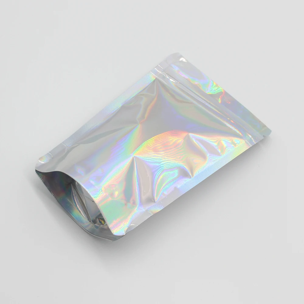 Thick 50pcs Aluminum Foil Laser Zip Lock Pouch Clear Hologram Rainbow Stand Up Zip Lock Plastic Packaging Bag with Tear Notch