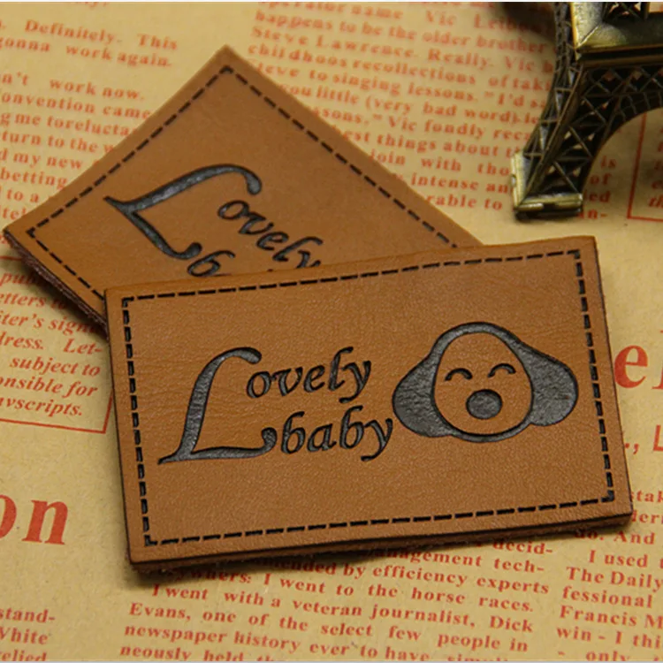 custom leather labels for jeans, bags, shoes in high quality, real leather/genuine label, debossed/engraved logo