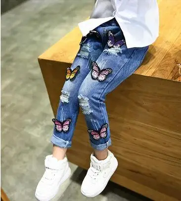 

Baby Jeans 2024 Spring Children New Year Spring Cartoon Butterfly Horn Jeans Girls Pants