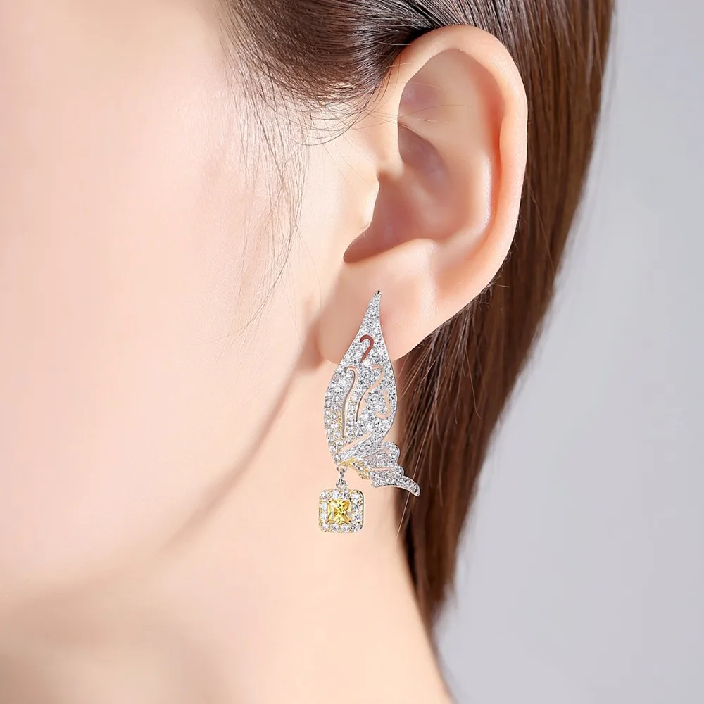 LUOTEEMI Asymmetrical Flying Shiny Butterfly Drop Earrings for Women Clear Yellow CZ Girl Korean Party Jewelry Christmas Gift