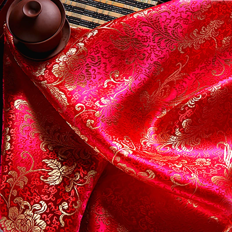 High quality brocade jacquard polyester red background golden Phoenix Tail fabric for patchwork tissue women dress by 100x90