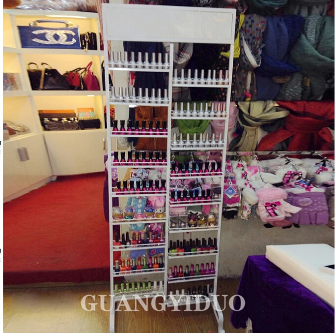 wrought iron nail polish rack.. Cabinet salon shelf. Show. Cosmetics.