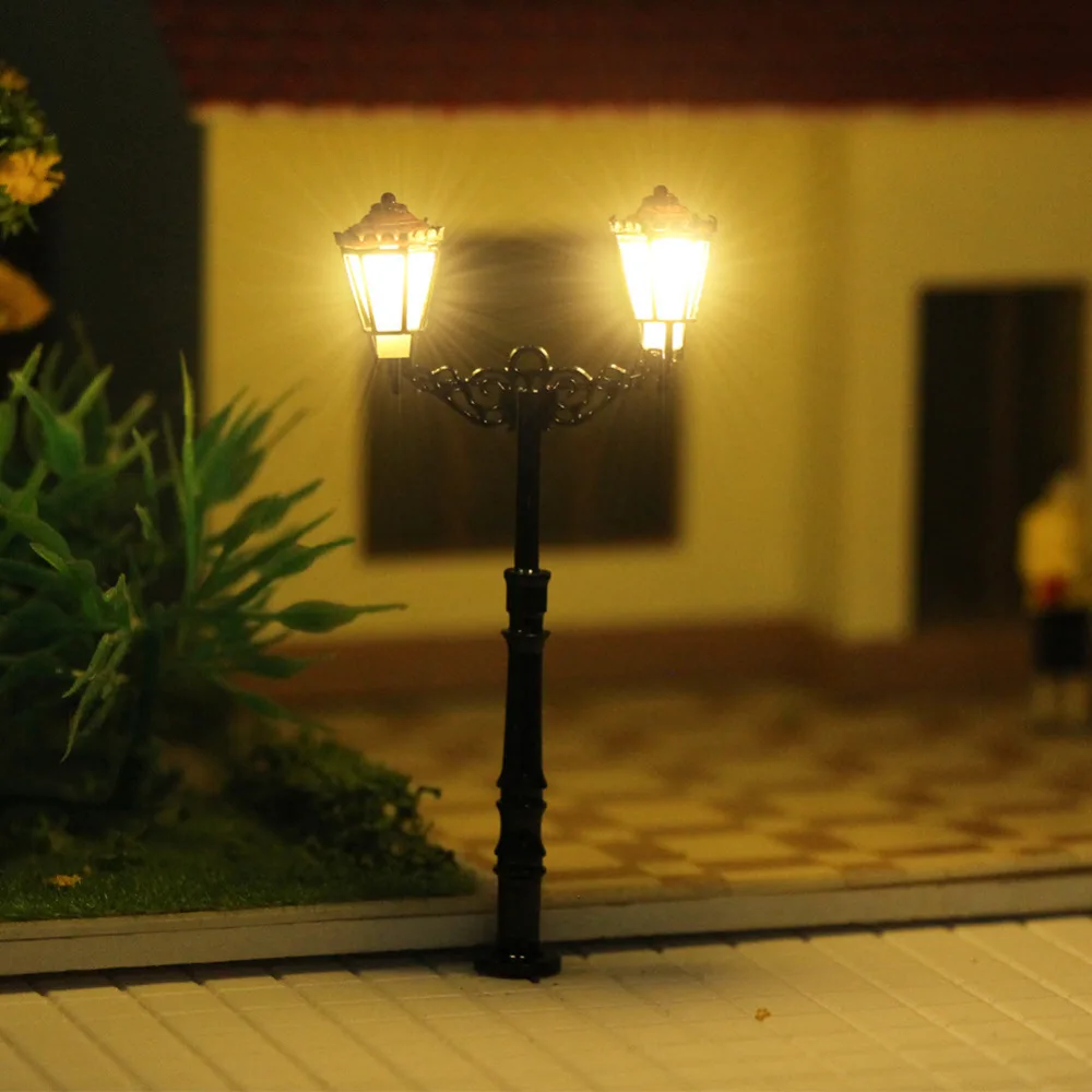 

Evemodel 3pcs N Scale Lamp Post Double Heads 50mm 1:160 Street Lights Model Railway Train LEDs LQS77N