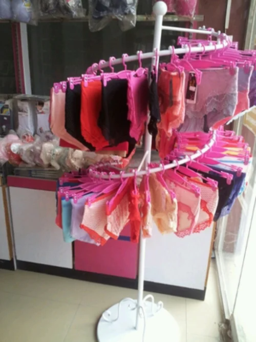 

Quality goods bag mail , wrought iron within the rotating racks, display shelf bra console underwear underwear rack shelf