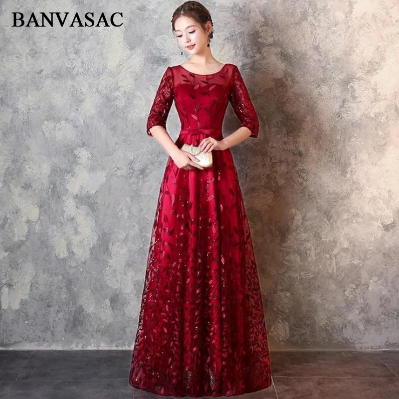 

BANVASAC Illusion Lace O Neck Sequined Appliques A Line Long Evening Dresses 2018 Party Bow Sash Backless Prom Gowns