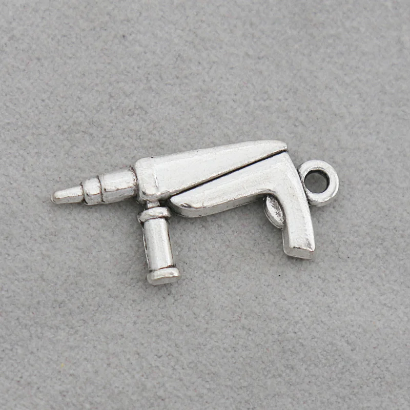 

RAINXTAR 20pcs Fashion Antique Silver Color Electric Tool Charms Electric Drill Shape Hardware Tool Charms 12*27mm AAC1320