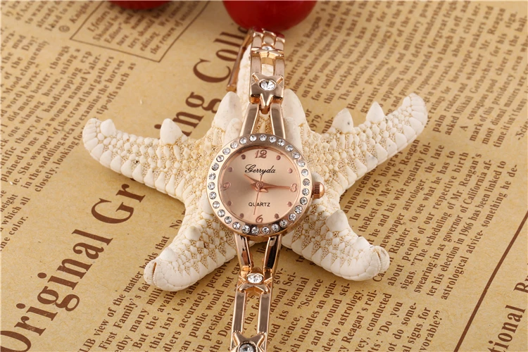 

Free shipping!Promotion!!Star bracelet style metal chain band,gold plating case/crystal deco,Gerryda quartz lady bracelet watch