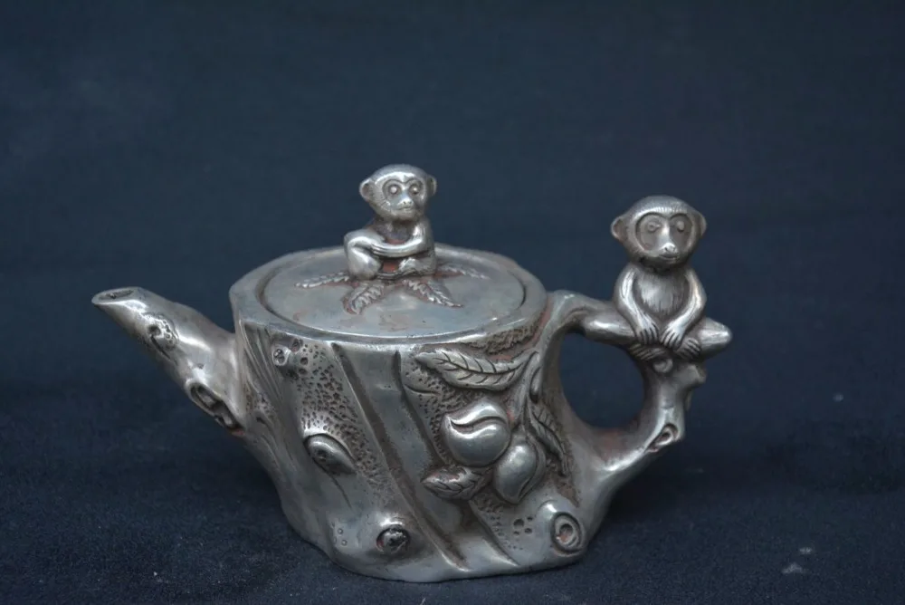 

Very rare Qing Dynasty (QianLong1711-1799)silver teapot,Monkeys take peach trees,with mark,Decoration,Free shipping,