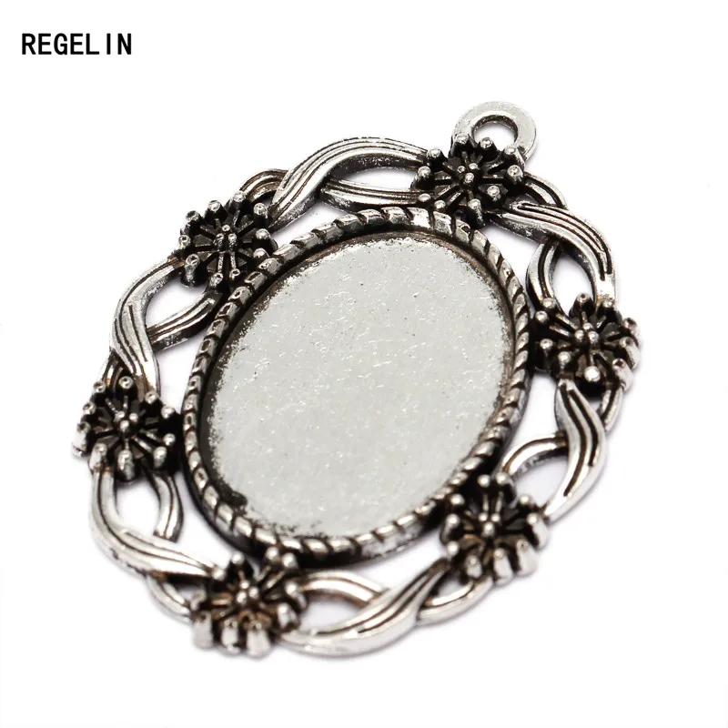 REGELIN 10pcs/lot Antique Bronze Tone Oval filigree Frame Cabochon Settings Blank Base Fit 18*25mm Cameo Jewelery Making Finding