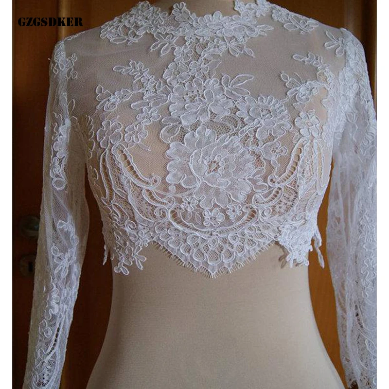 Nuove giacche da sposa in pizzo a maniche lunghe gioiello collo Appliques Tulle bianco avorio corto Bolero da sposa giacche avvolge immagine reale 2019