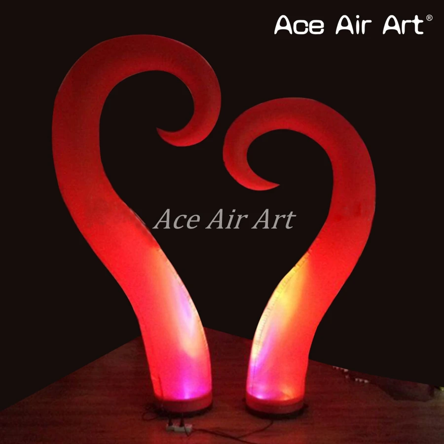 Unique Shape Spiral Cone Inflatable Hook Style Pillars Horns with Base and Blower Spotlights for Stage and Party Decoration