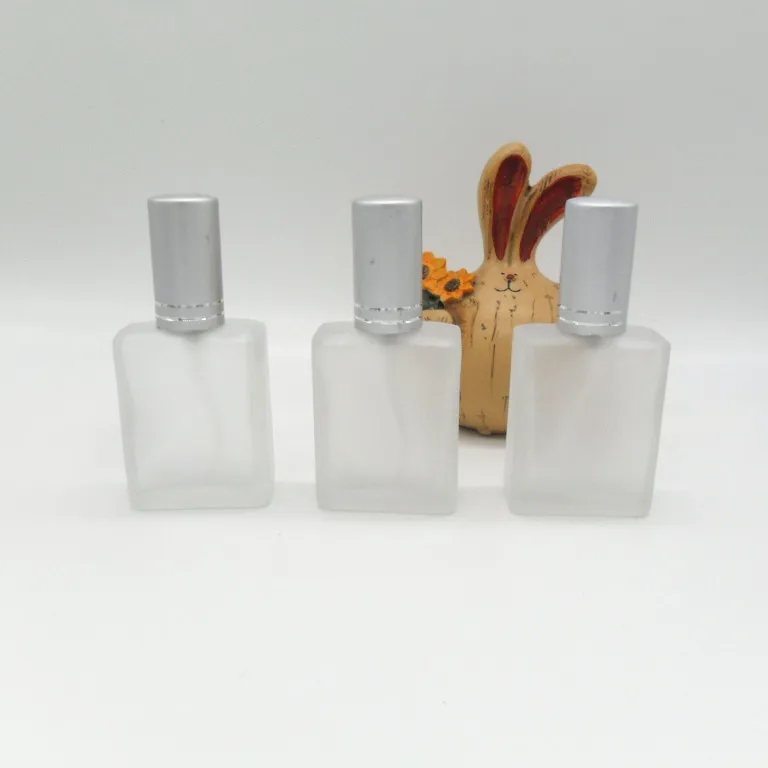 

100pcs wholesale 15ML flat Quartet Frosting spray glass perfume bottles with silver pump ,0.5ounce frosted glass perfume bottle