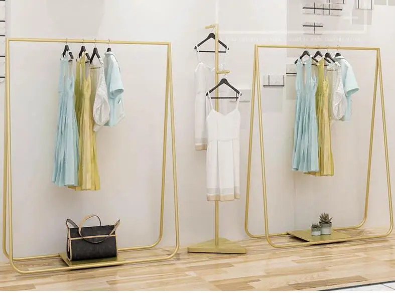 The new clothes store display rack is a floor-to-ceiling women's clothing rack.