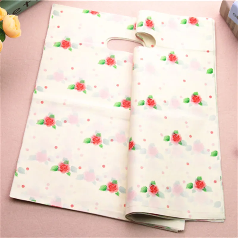  New Design Wholesale 100pcs/lot 30*40cm Large Shopping Package Bags With Flowers Plastic Clothing Packaging Bags