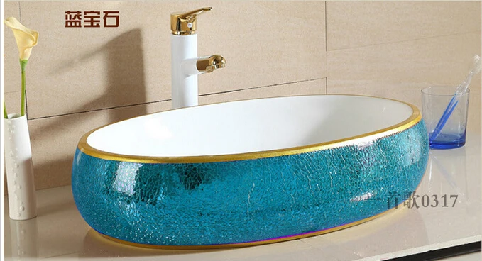 European stage basin. Ceramic Mosaic gold lavabo. Oval. Golden lavatory.