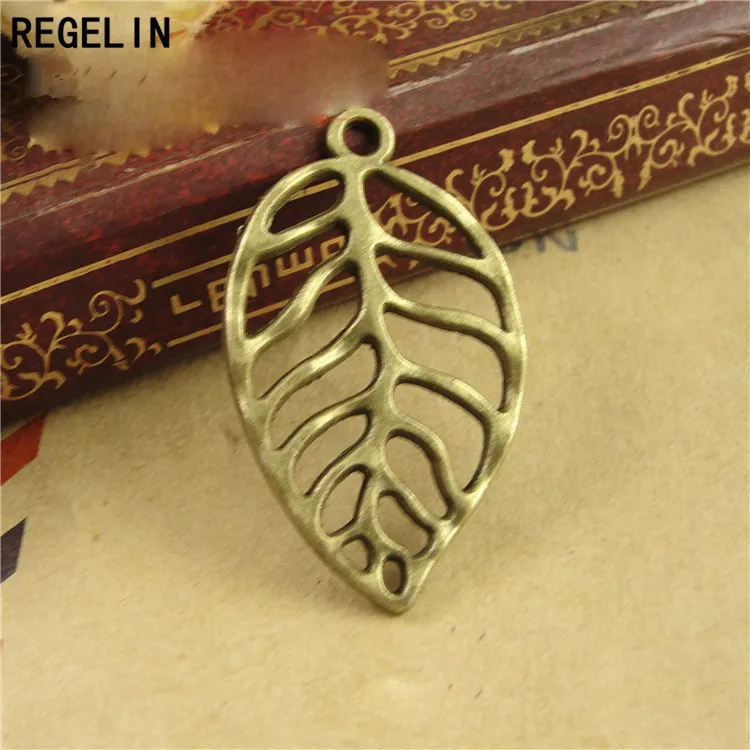 REGELIN ทิเบต 30x18 มม.สีเงิน/Antique Bronze Hollow Tree Leaf Charms Antique Bronze ใบ 20pcs เครื่องประดับ DIY เครื่องประดับ