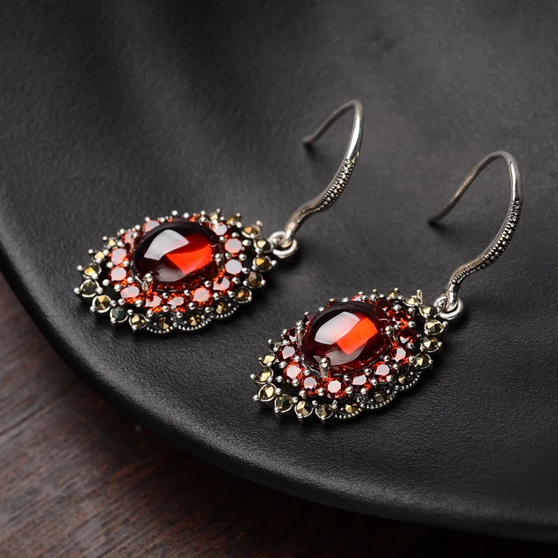 

S925 pure silver earrings temperament of women with red zircon oval national wind tremella jewelry gifts