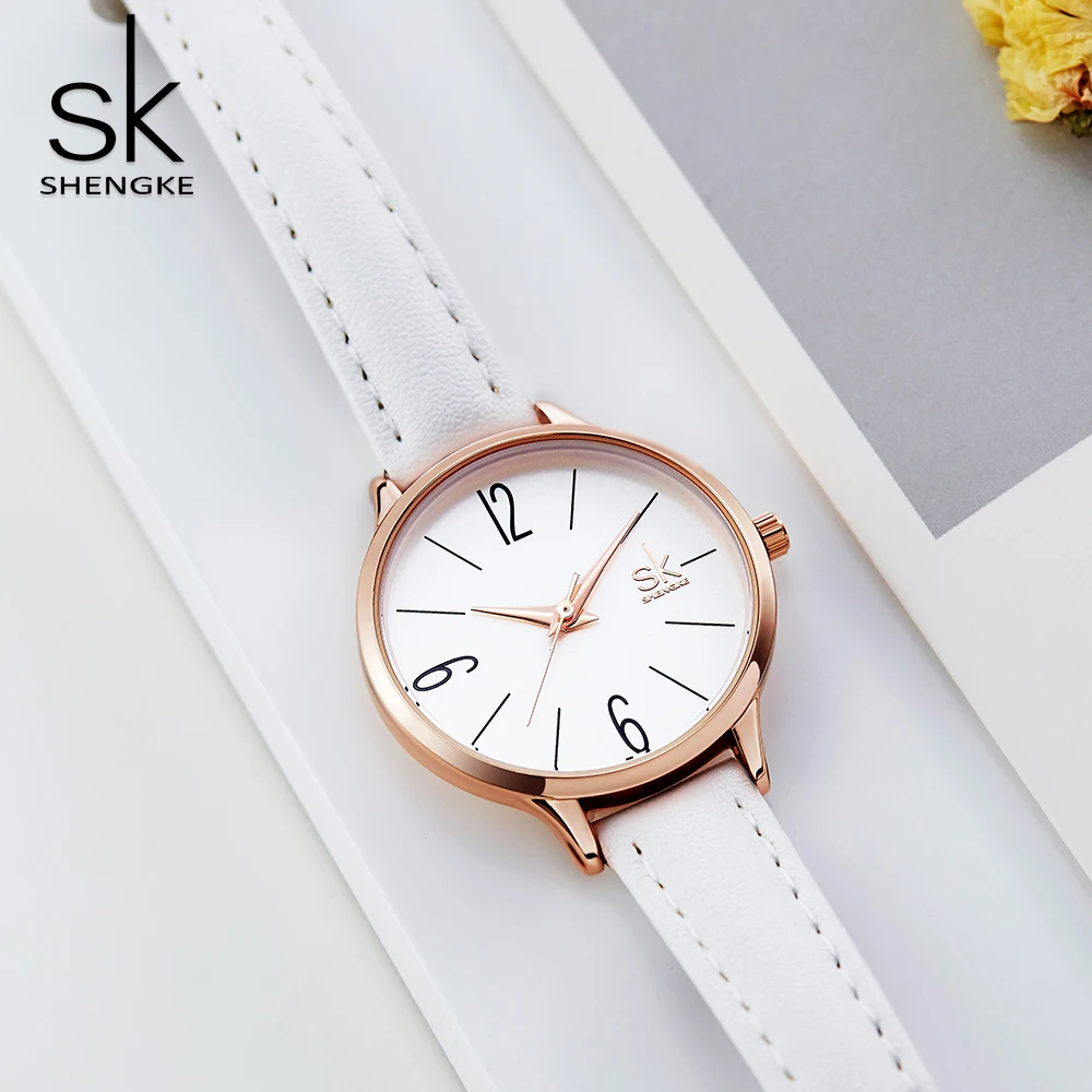 Shengke Fashion Female\'s Watches White Leather Girl Wristwatches Simple Women Quartz Clock Comfortable Buckle Round Case Hour