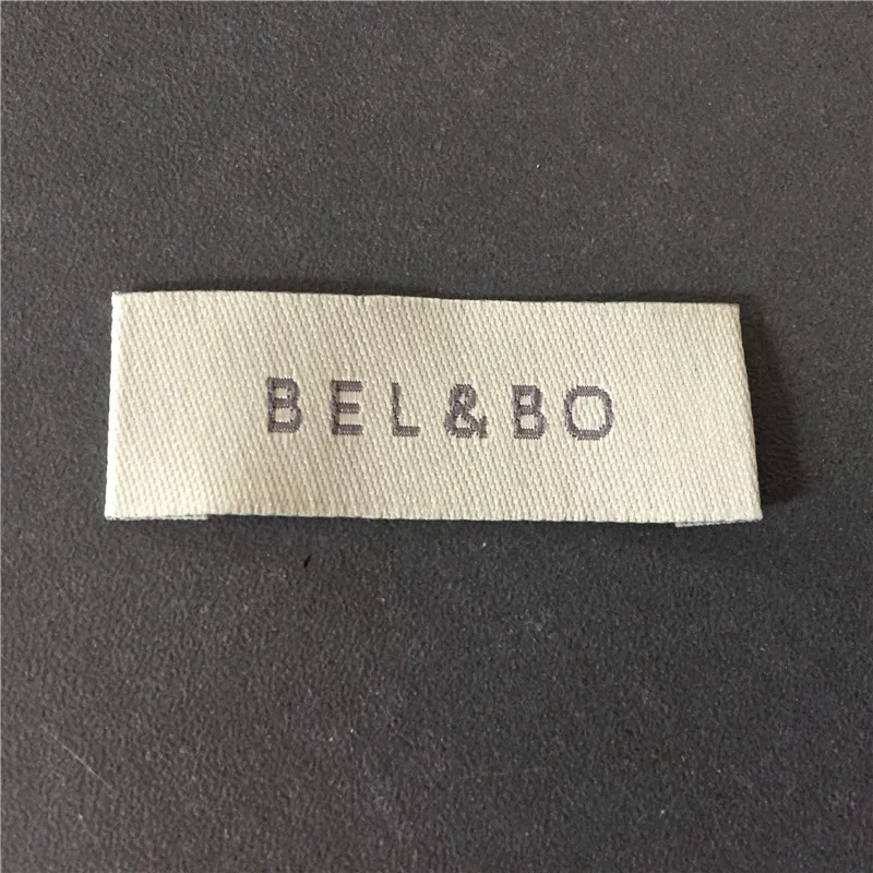 

Custom High Quality Clothing Main Labels Purple Color Name Letters