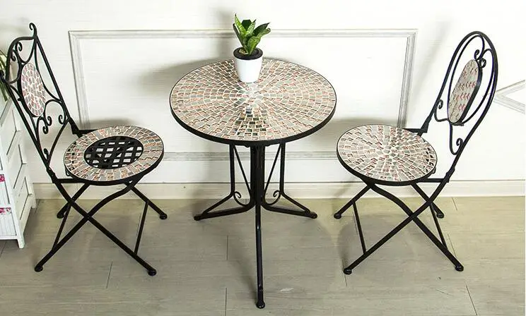 Balcony chairs. Mosaic table