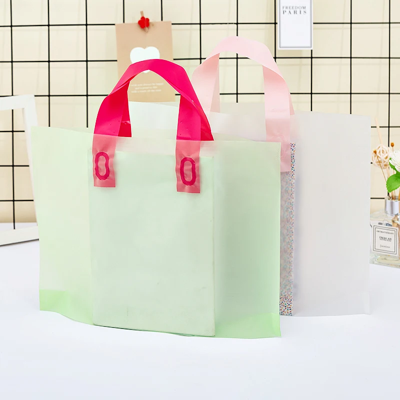 50pcs/lot High-grade Transparent Thick green Plastic Carry Bag Plastic Shopping Bags With Handle Shopping Gift Packaging Bags